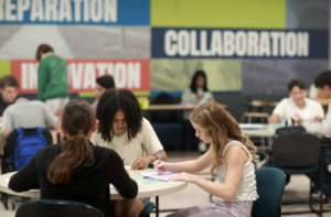 Students work on an art project on the first day of classes at the Academy of Technology and Innovation at UMW. The new lab school, located at Mary Washington’s Stafford Campus, welcomed more than 80 students for its inaugural year. Photo by Karen Pearlman.